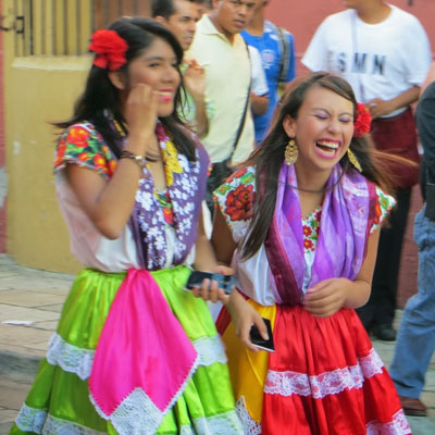 Two Girls in a Guelaguetza Parade, photo Marcia Schirber