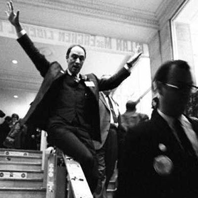 Pierre Trudeau sliding down bannister, Ted Grant photographer